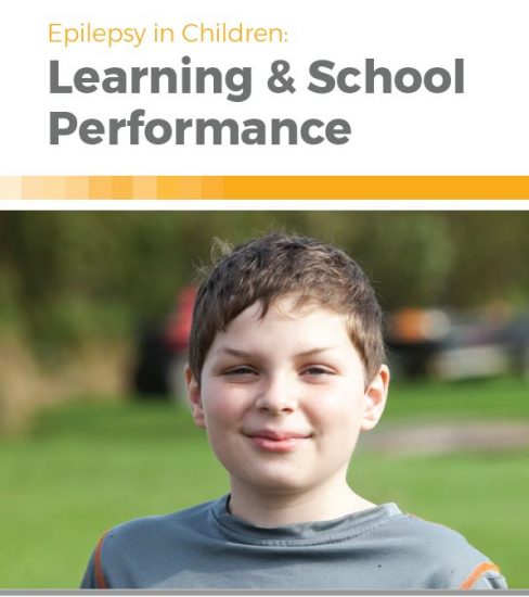 Booklet cover — closeup of young boy smiling with the title, Epilepsy in Children: Learning & School Performance.