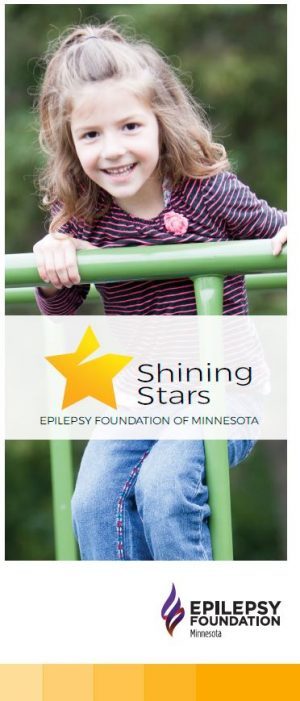 Brochure cover — image of a young child playing on a playground, with the Shining Stars program logo.