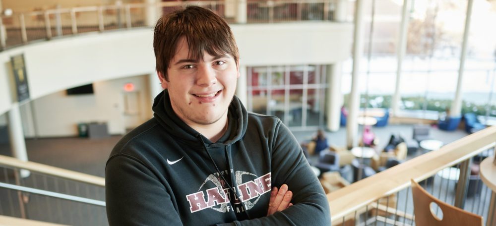 male college student in library