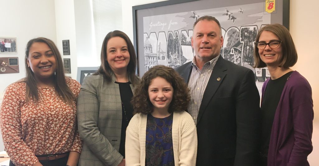 advocates posing with minnesota legislator