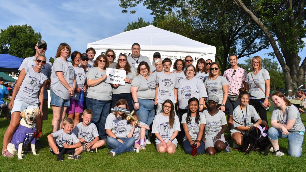 large walk team posing for camera