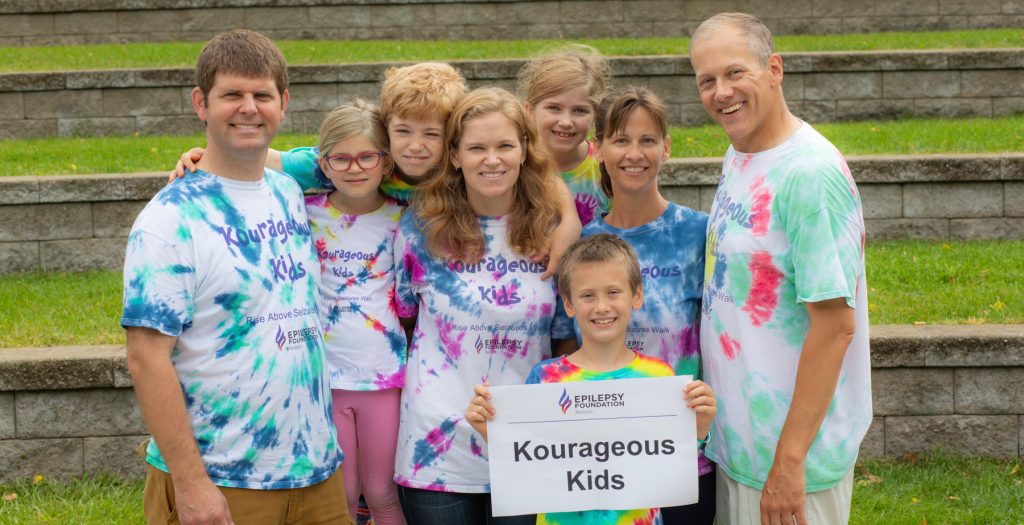 kourageous kids walk team smiling in tie dye shirts