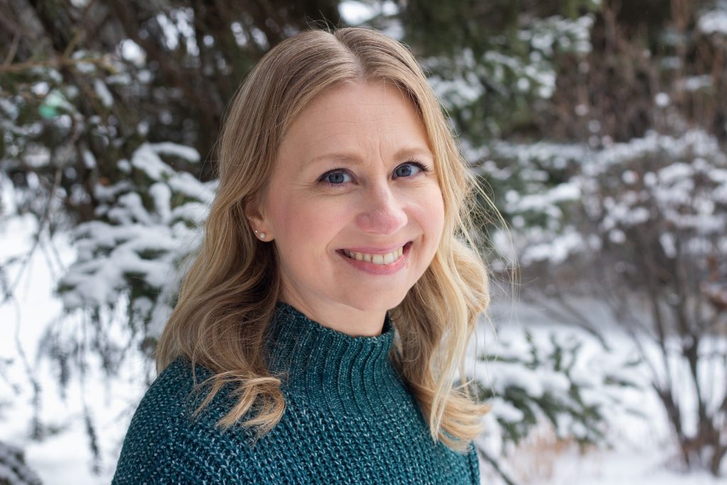 adult woman with snow in the background