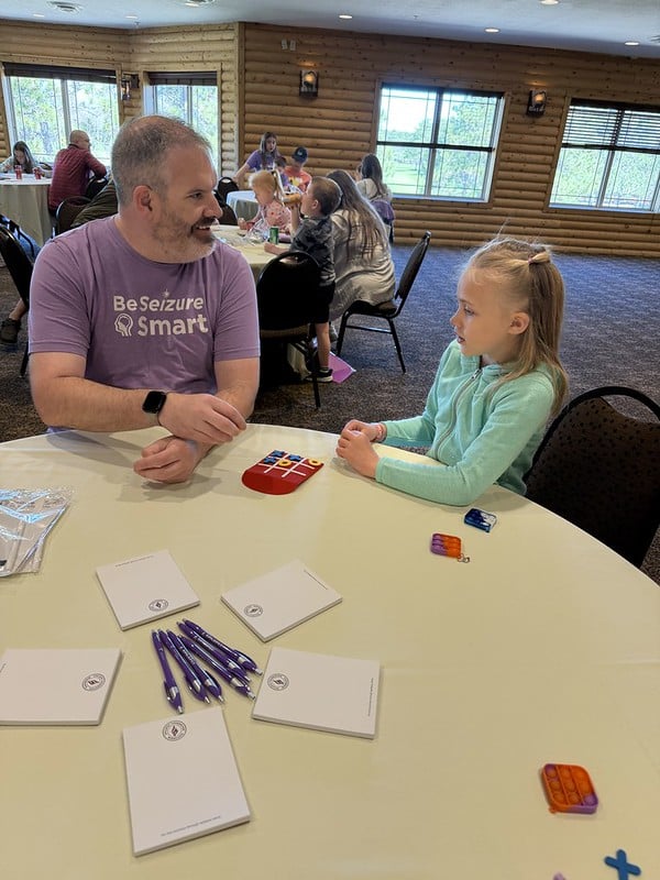 Families playing Tic-Tac-Toe games at  the event