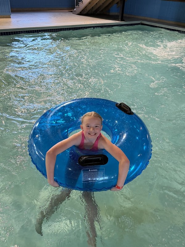 Attendee in an inner tube at the waterpark